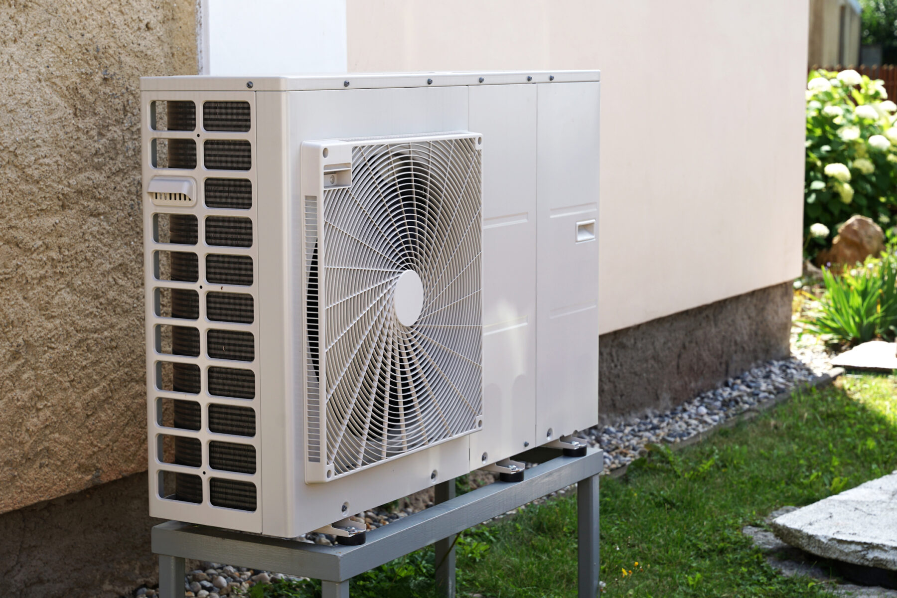 Installed heat pump outside a Wisconsin home