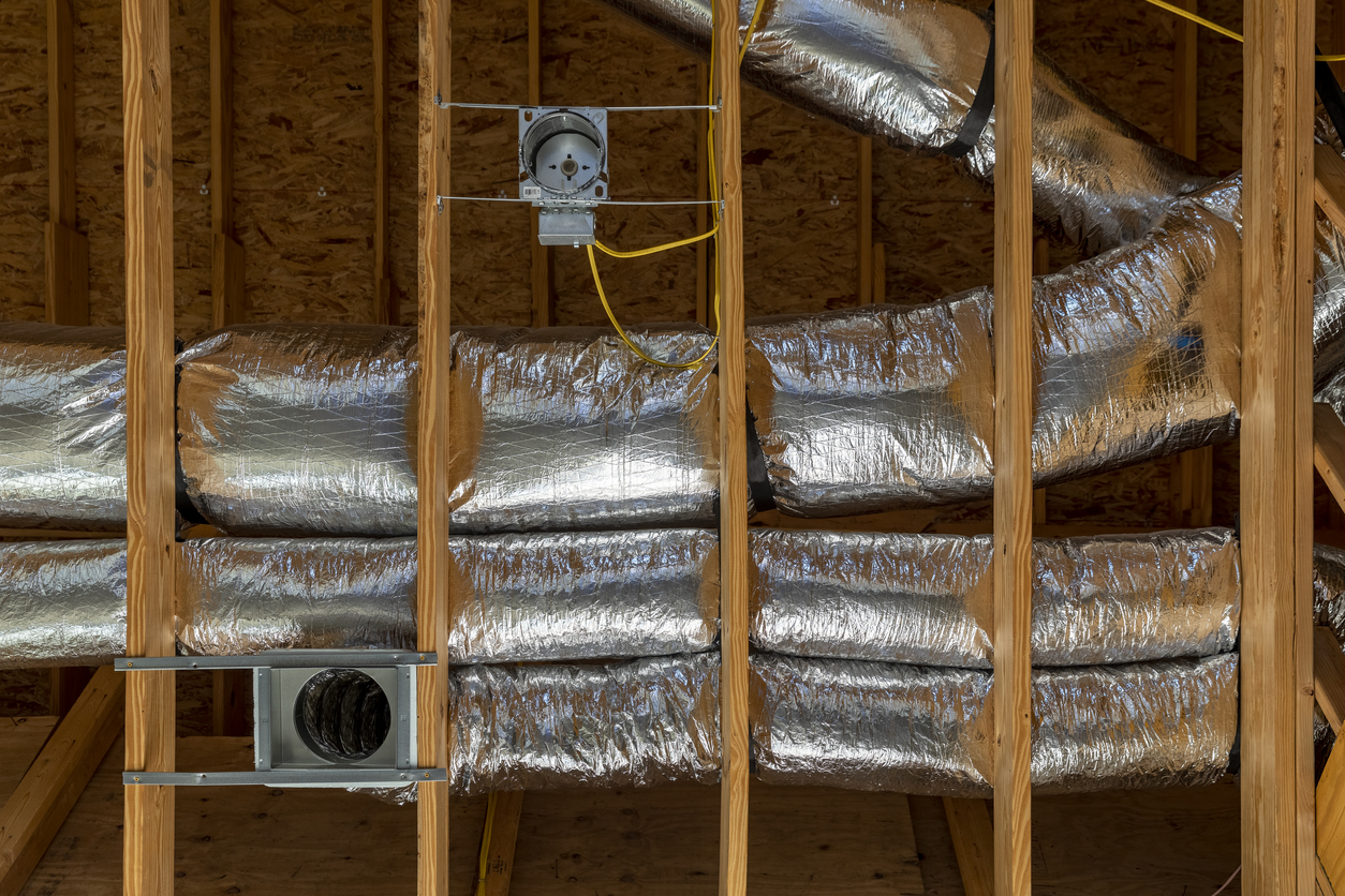 Ductwork within the open walls of a newly constructed home